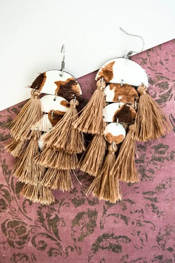 Cascading hide cow earrings